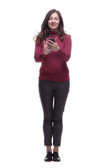 in full growth. casual young woman reading email.