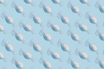 Abstract set of blue candy on light blue backdrop. seamless pattern