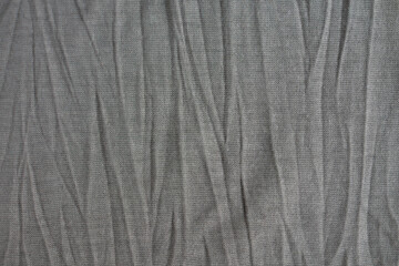 gray crumpled fabric closeup. texture