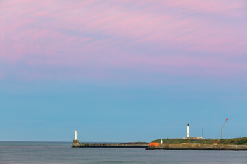 Fototapeta premium Beautiful evening seascape with pier at sunset time