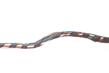 Large wide cable with multicolored orange and green wires, connectors and terminals in the wiring...