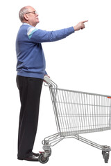 elderly man with a shopping cart showing the OK gesture.