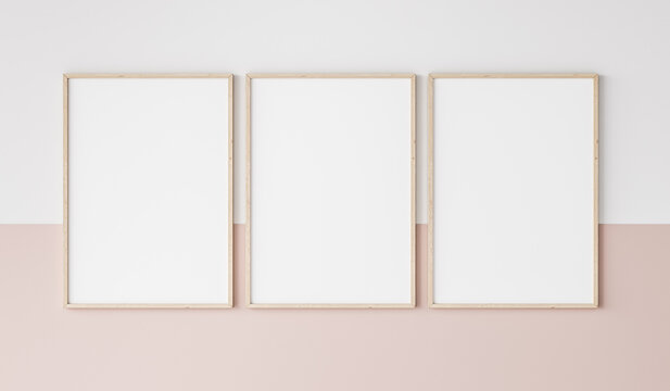 three wooden frames on pink and white wall, frame mockup, 3d render	