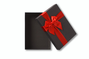 Open black gift box with red ribbon on white background. Isolate.
