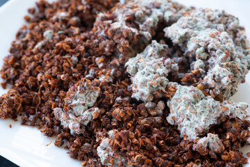 moldy on red Cayenne pepper background