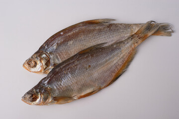 Dried bream and sea roach fishes isolated on the white background