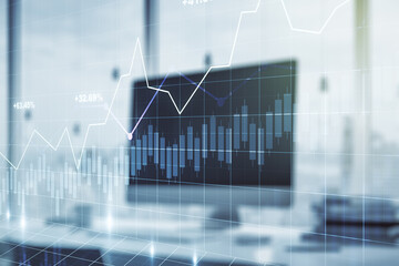 Multi exposure of abstract financial graph on laptop background, financial and trading concept