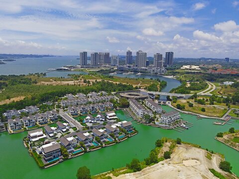 Emerald Bay residences on man-made island, aerial photography with bungalow houses and villas near Iskandar Puteri of Puteri Harbour