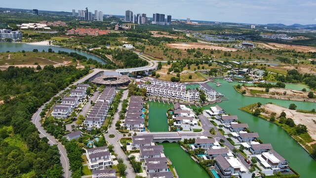 Emerald Bay residences on man-made island, aerial photography with bungalow houses and villas near Iskandar Puteri of Puteri Harbour