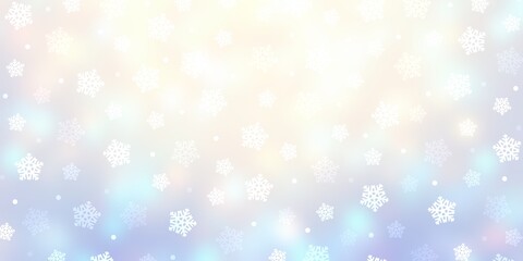 Christmas snowflakes pattern on light blue blurred background. Winter holidays decor.