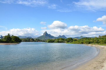 View of Tamarin Bay in Mauritius, including the beach and mountains in the background