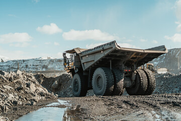 Career dump truck at the gold mining site.