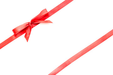 Red ribbon with bow isolated on white. Top view. Copy space