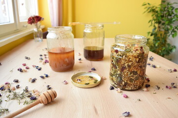 Homemade recipe for immunity, honey with seeds in the jar, on a kitchen table.  Healthy food lifestyle.