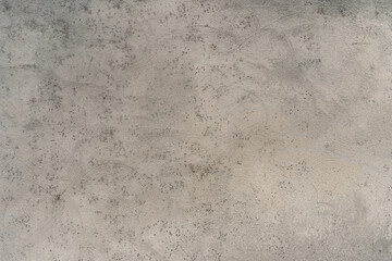 Light gray texture with small spotted pattern. Plastered wall. Abstract background. High quality photo