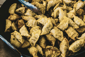 gyoza, Japanese fried dumplings in a pan. Street food