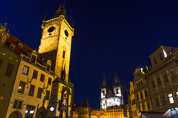 Fototapeta na wymiar Watercolor drawing of Prague Old Town Square (Stare Mesto) historical city centre. Astronomical Clock (Orloj) and Tower of City Hall building, Gothic Church, night view, Bohemia, Czech Republic