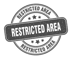 Fototapeta premium restricted area stamp. restricted area label. round grunge sign