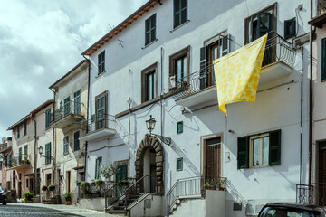 old houses on historical village street, Capodimonte, Italy