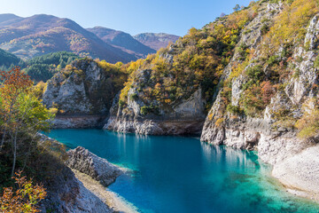 Naklejka na ściany i meble San Domenico Lake during autumn season, near Villalago village, Abruzzo, central Italy.