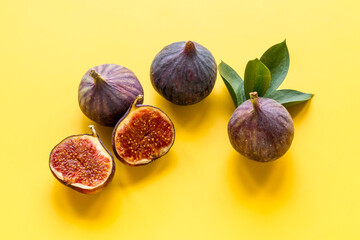 Fresh purple fig fruit with leaves. Close up