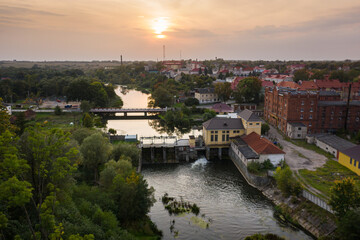 Aerial view of the small hydroelectric power plant on the Angrapa river in Ozersk, Kaliningrad, Russia