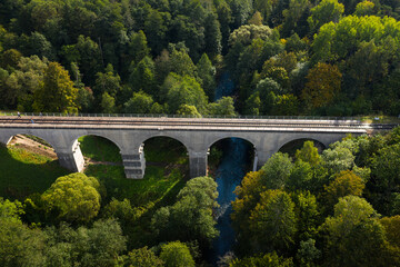 Fototapeta na wymiar Aerial view of the old Prussian viaduct in Rominta forest, Russia