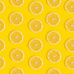 Seamless pattern of lemon on yellow background