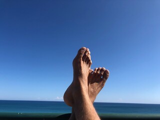 feet on the beach