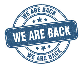 we are back stamp. we are back label. round grunge sign