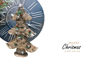 Burlap Christmas tree on the background of the clock.