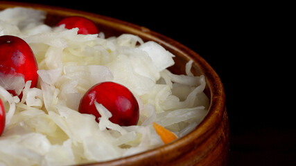 Sauerkraut with cranberries in a pot.
