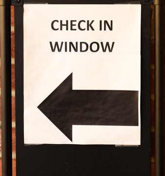 Sign For Contactless Check In At A Window