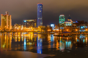 Fototapeta na wymiar Yekaterinburg.City center at night.Iset river and dam.