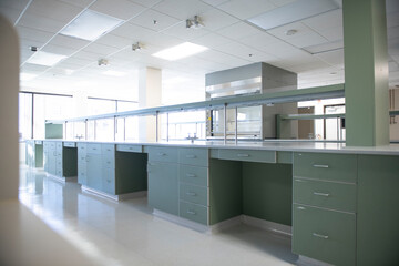 Empty biotech lab with no people and green benches