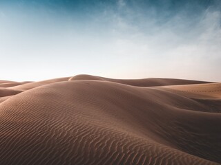 Fototapeta na wymiar Sand dunes in the desert.