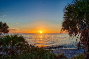 Fototapeta na wymiar Sunset over the Gulf of Mexico from Caspersen Beach in Venice Florida in the UNited States