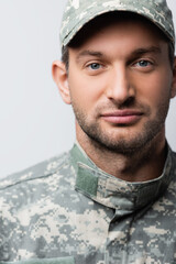 military man in uniform looking at camera isolated on white