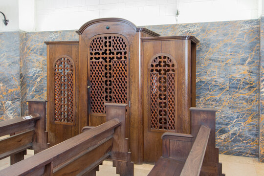 Old Roman Catholic Wood Confessional In A Church