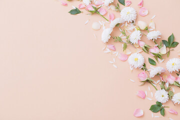 Fototapeta na wymiar pink and white flowers on paper background
