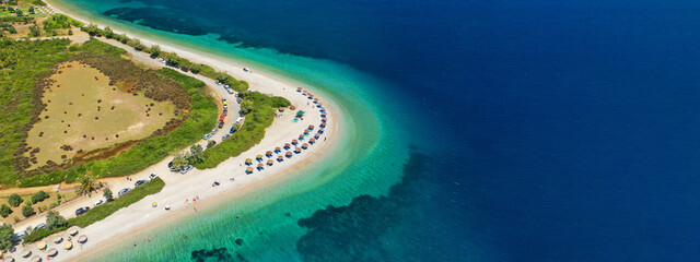 Fototapeta na wymiar Aerial drone ultra wide panoramic photo of beautiful azure turquoise crystal clear sandy beach of Agios Dimitrios in Alonisos island, Sporades, Greece