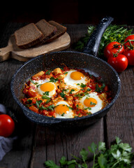 shakshuka with corn and tomatos