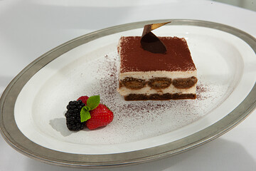 cake with chocolate and fresh berries
