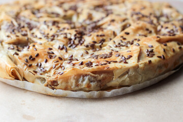 Delicious meat pie from puff pastry, which is traditionally prepared in the Balkans