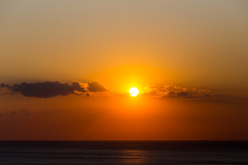 Beautiful evening sunset over the sea orange color