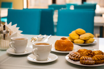 Served tasty with bakery and coffe close up view on natural background.