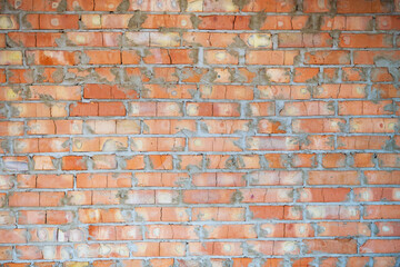 Background of a brick orange wall texture, close-up, place for an inscription.