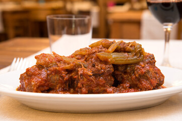 meat  tail dish specialty from lazio region and Roma area called coda alla vaccinara