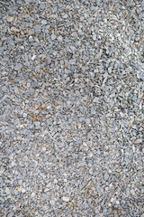 Crushed stone background, gray stone texture.