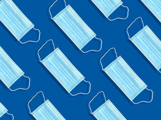 Medical mask on a blue background. Disposable face masks for viruses